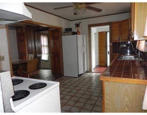 142 Swifts Beach Road Wareham, MA 02571 - Photo 6 of 10 a kitchen with sink and cabinets
