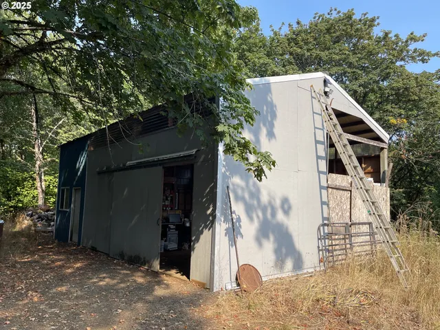 a backyard of a house with lots of green space