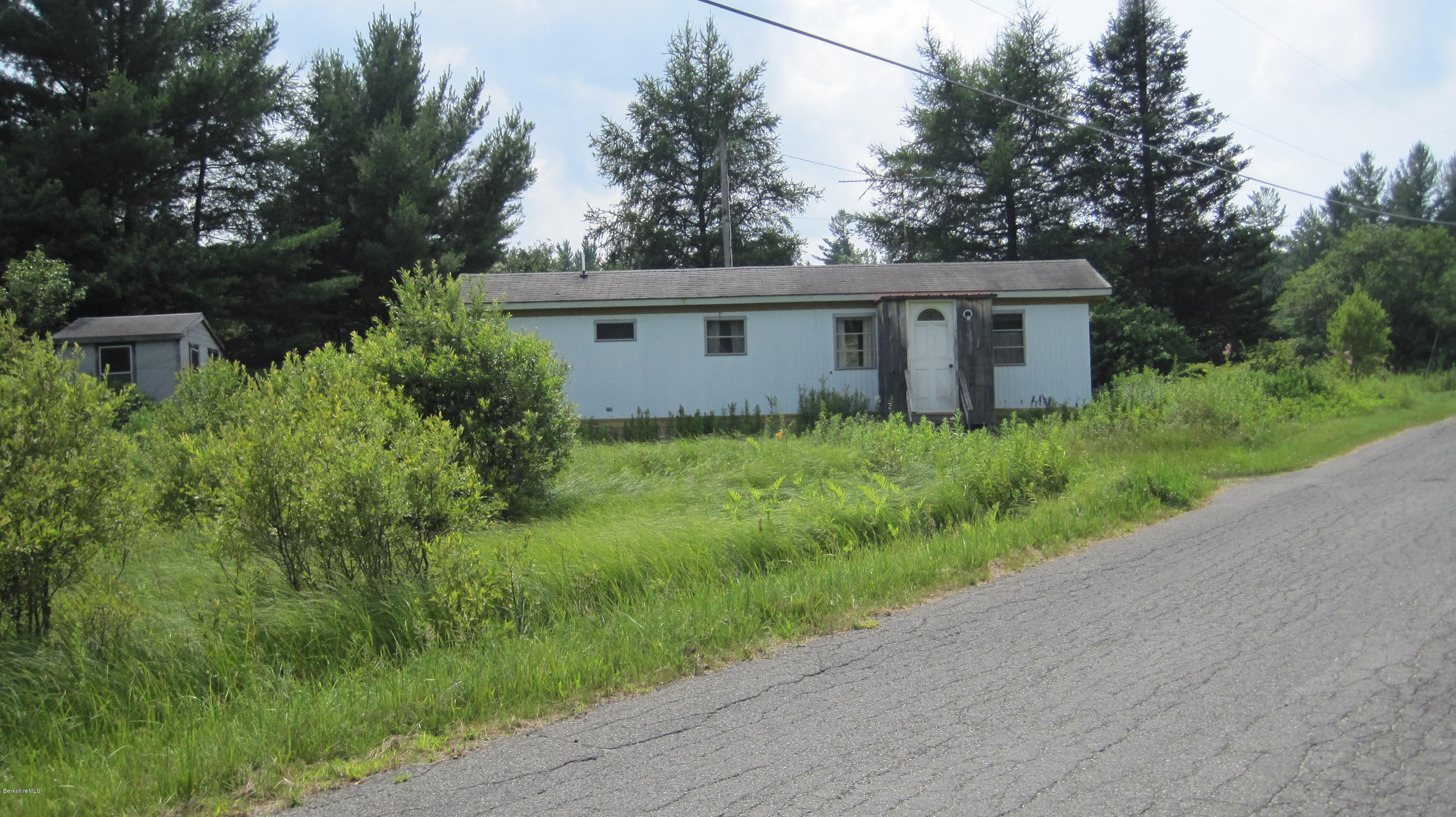 67 Briar Road Savoy, MA 01256 - Photo 6 of 6 a view of a house with yard and a garden