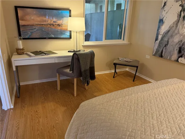 a workspace with furniture and window