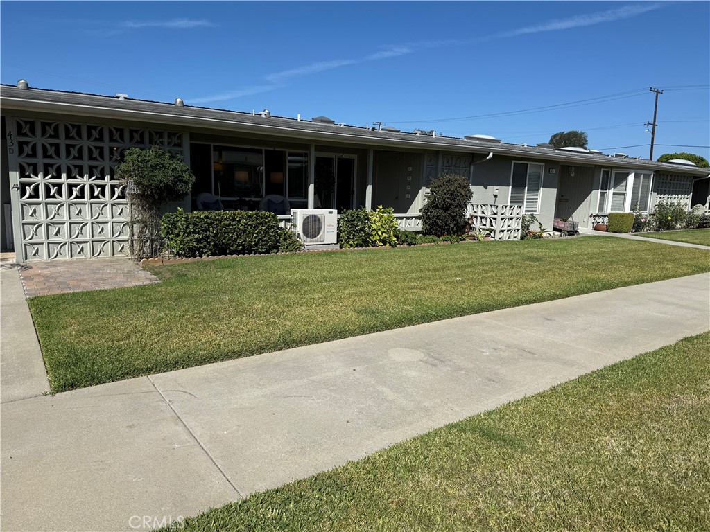 1670 Interlachen Road Seal Beach, CA 90740 - Photo 2 of 23 a front view of a house with garden