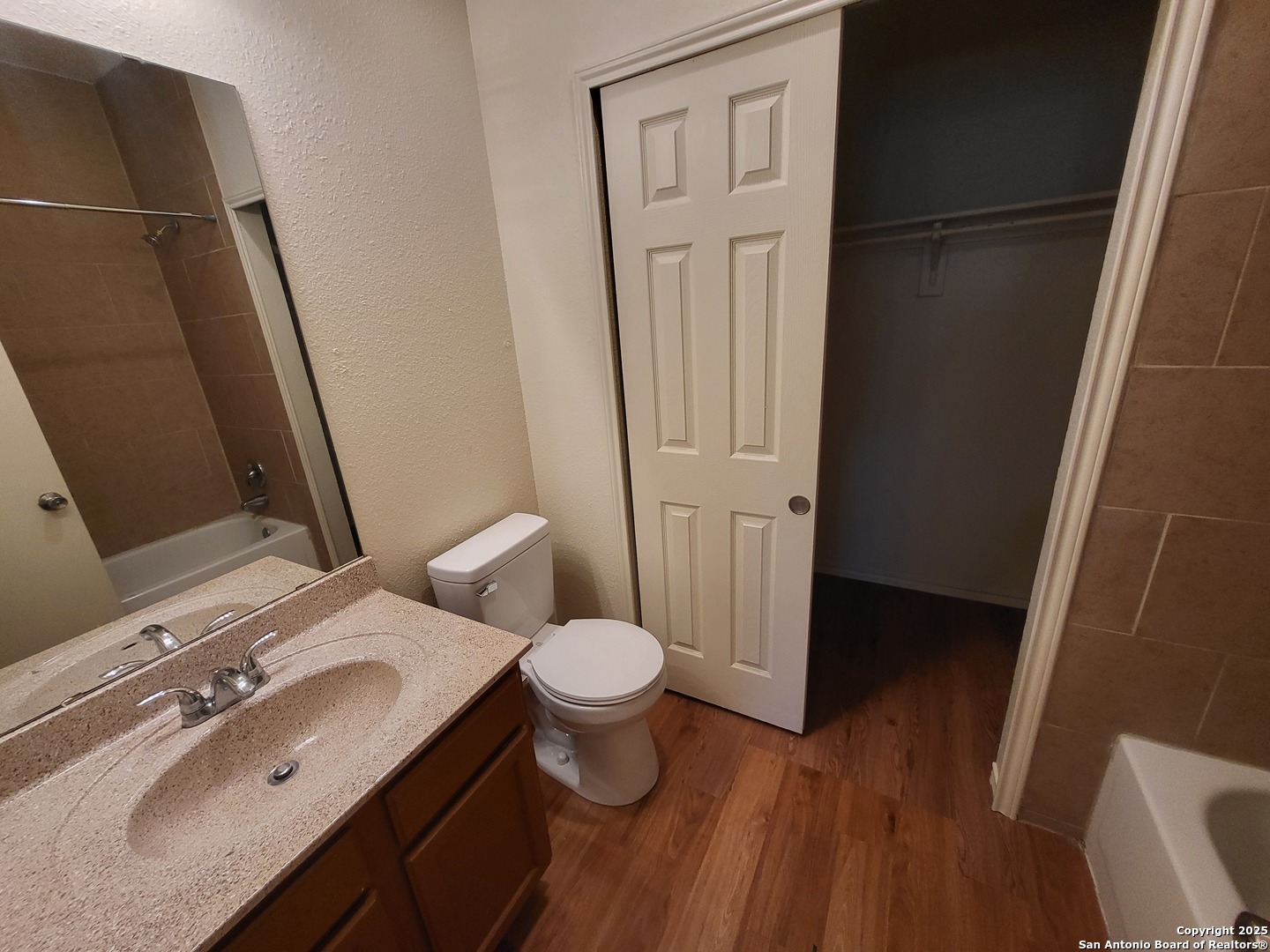 3405 Ridge Smoke San Antonio, TX 78247 - Photo 15 of 16 a bathroom with a sink toilet and shower