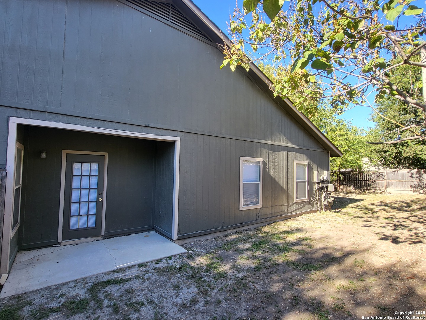 3405 Ridge Smoke San Antonio, TX 78247 - Photo 16 of 16 a view of a house with a yard