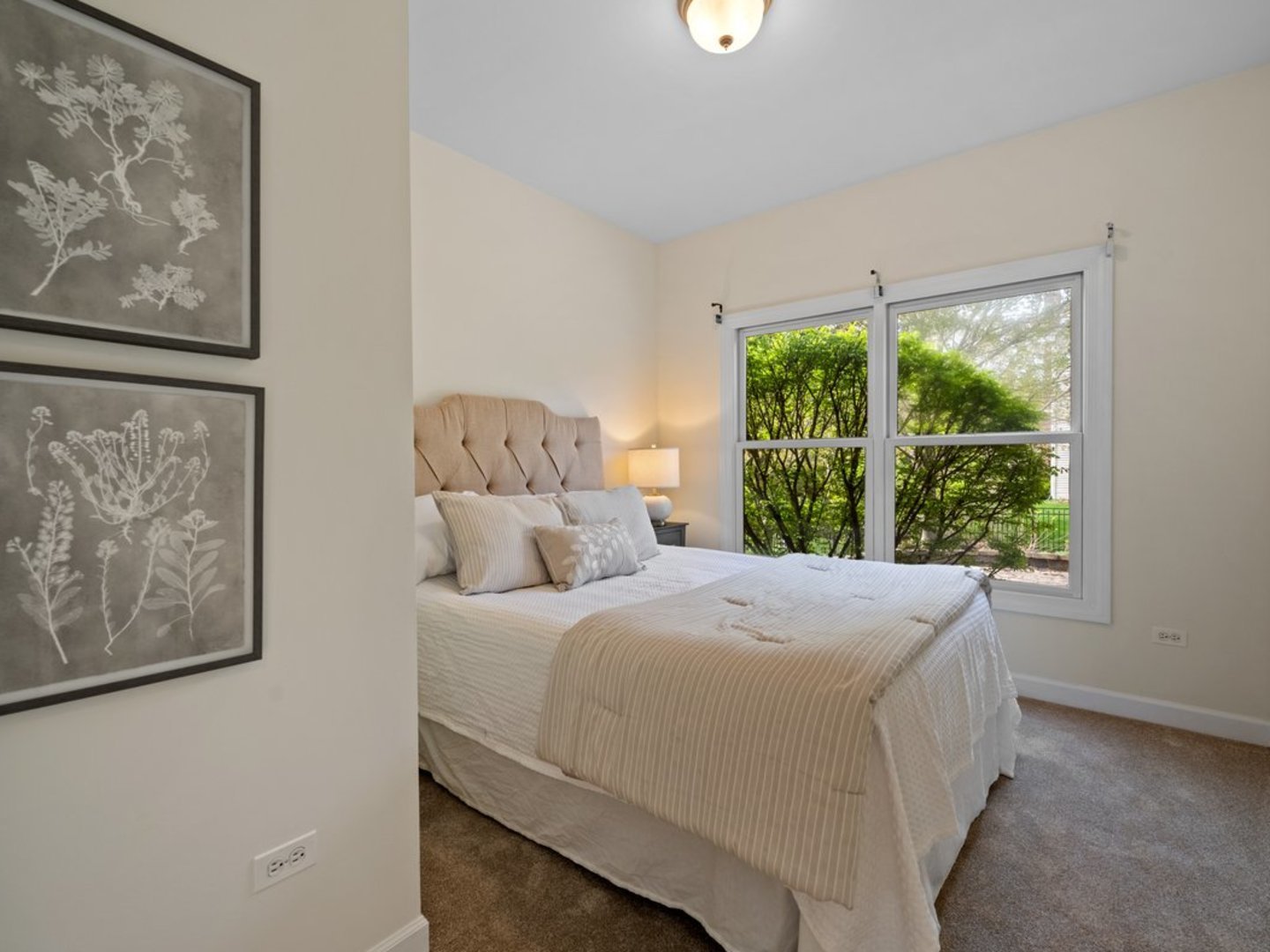 3035 Rollingridge Road Naperville, IL 60564 - Photo 12 of 28 a bedroom with a bed and a painting on the wall
