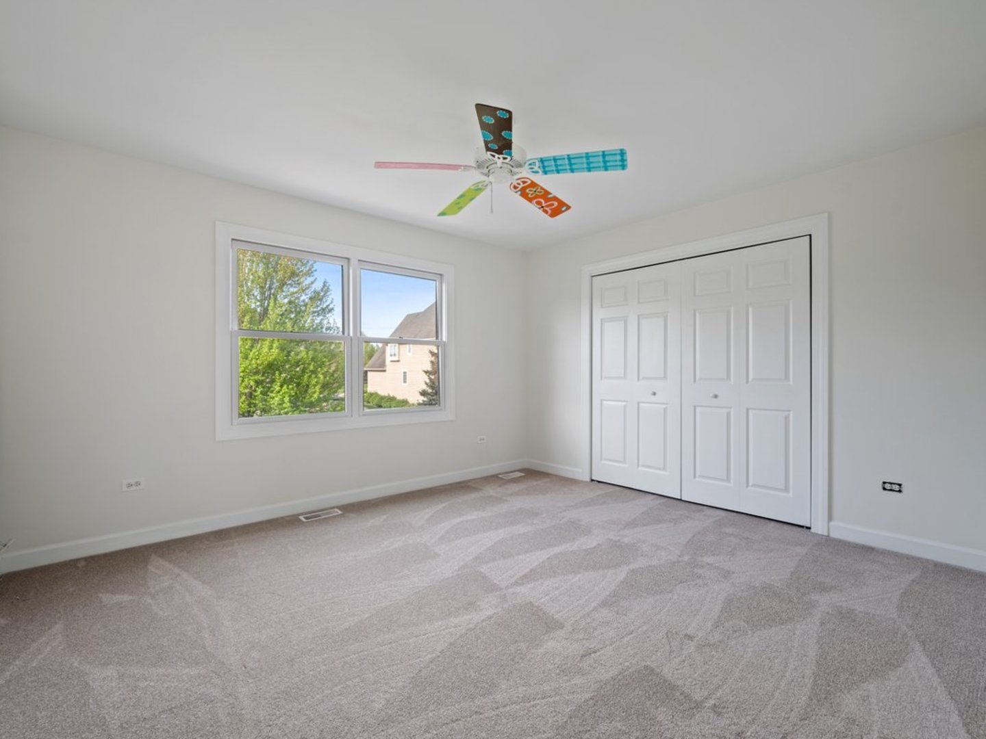 3035 Rollingridge Road Naperville, IL 60564 - Photo 18 of 28 an empty room with windows and entrance