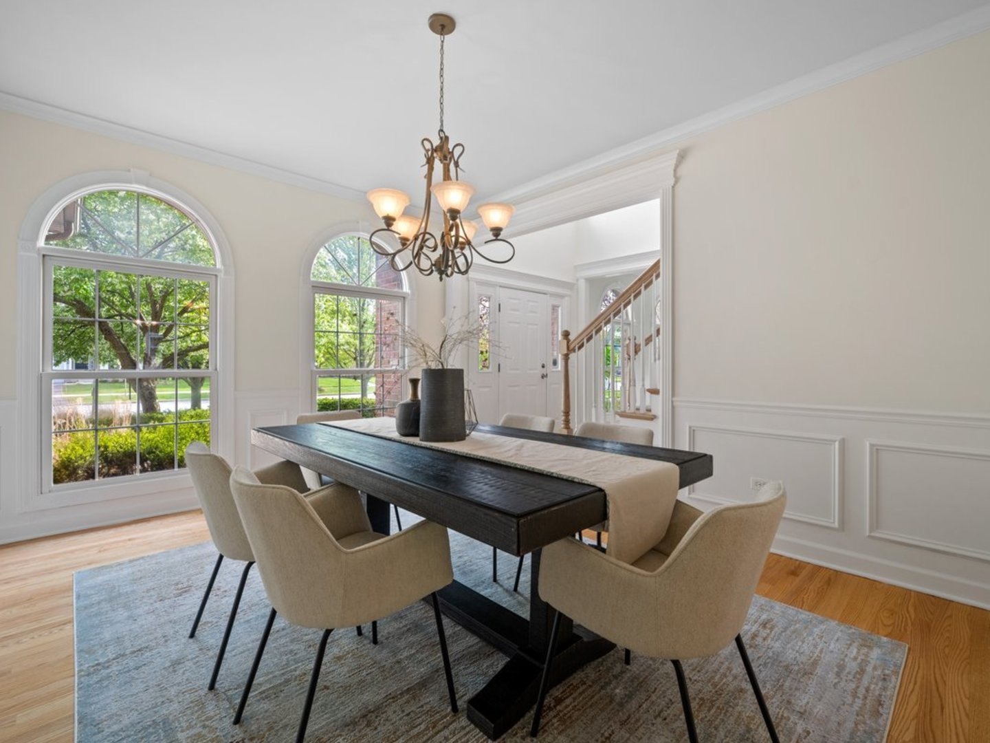 3035 Rollingridge Road Naperville, IL 60564 - Photo 10 of 28 a view of a dining room with furniture window and wooden floor
