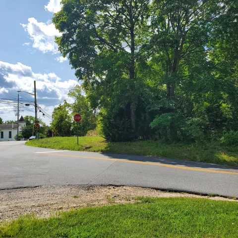 a view of a street with fire pit