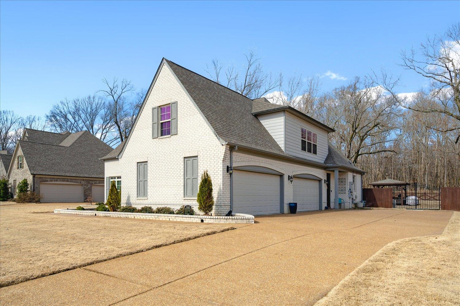 10460 Riley River Road Lakeland, TN 38002 - Photo 4 of 39 View of property exterior with a garage