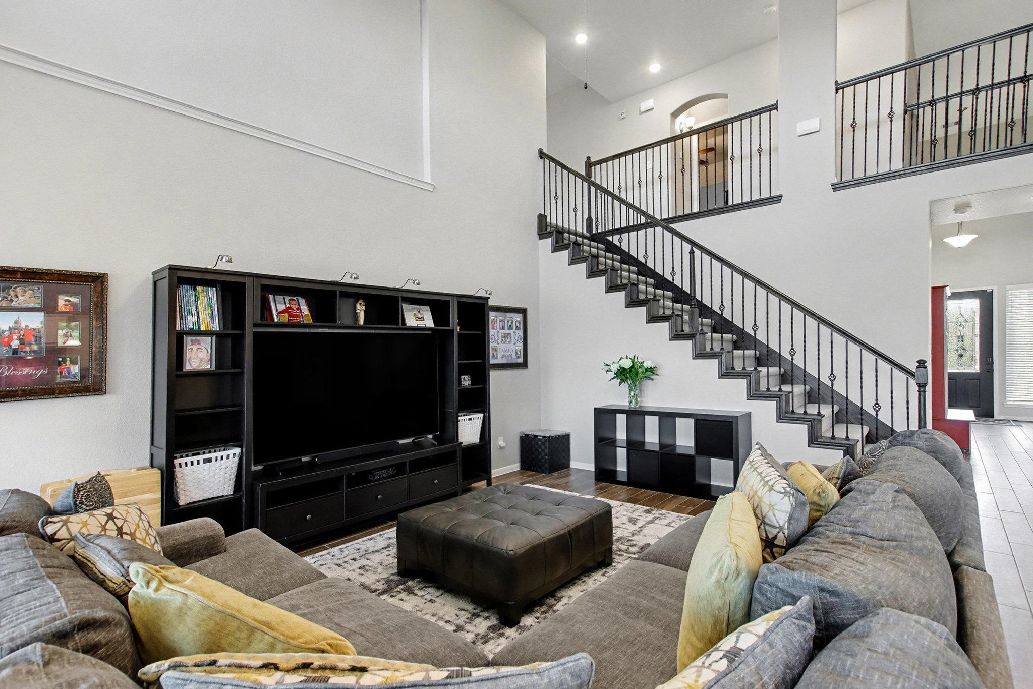 2510 Humble Way Rosenberg, TX 77471 - Photo 13 of 42 a living room with furniture and a flat screen tv