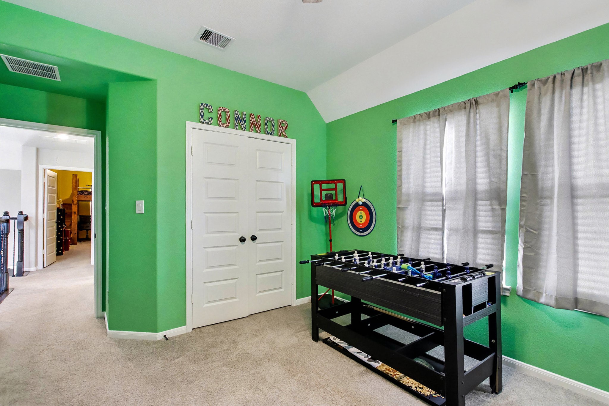 2510 Humble Way Rosenberg, TX 77471 - Photo 31 of 42 a view of outdoor space with a front door and windows