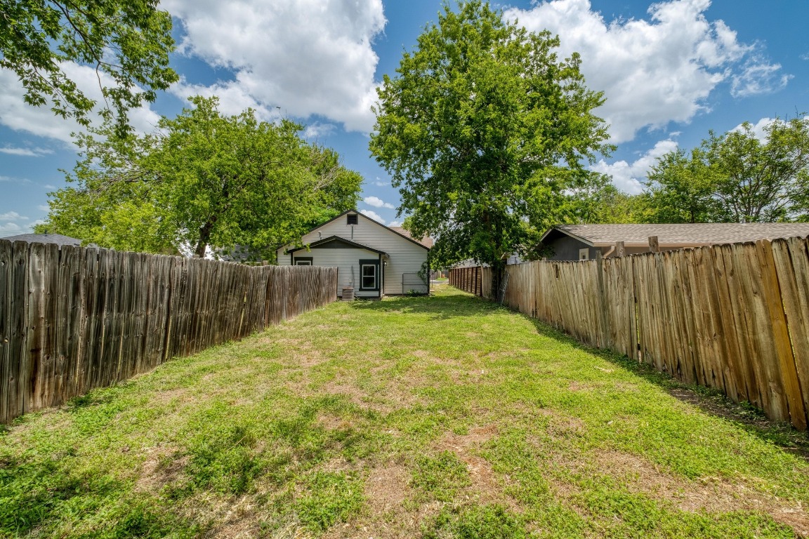 7406 Bethune Avenue Austin, TX 78752 - Photo 17 of 38 a swimming pool with wooden fence