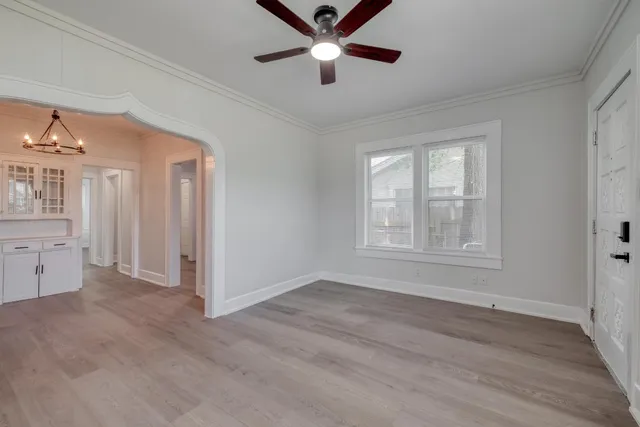 a view of an empty room with a window