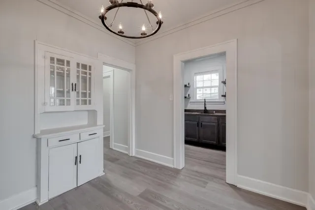 a view of a kitchen from the hallway
