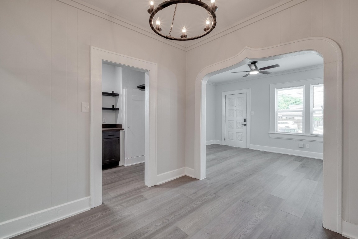7406 Bethune Avenue Austin, TX 78752 - Photo 23 of 38 wooden floor in an empty room