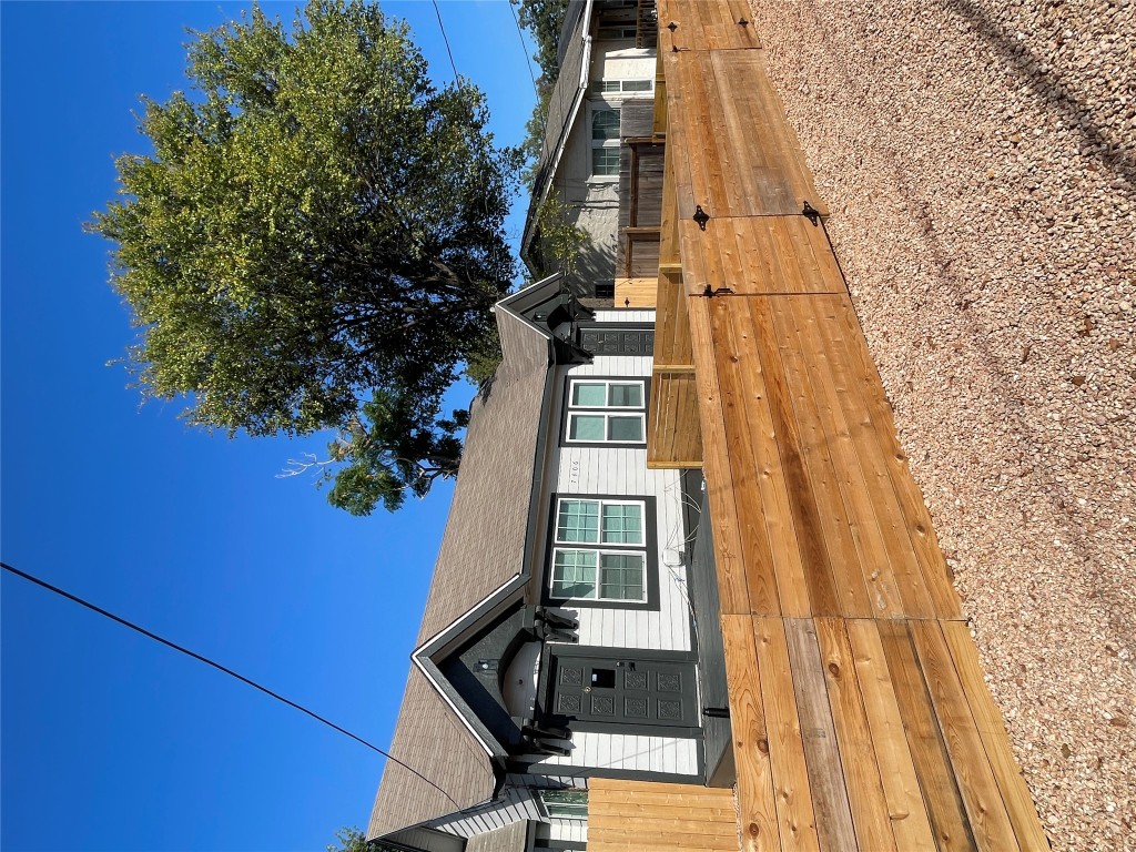 7406 Bethune Avenue Austin, TX 78752 - Photo 33 of 38 a front view of a house with a yard