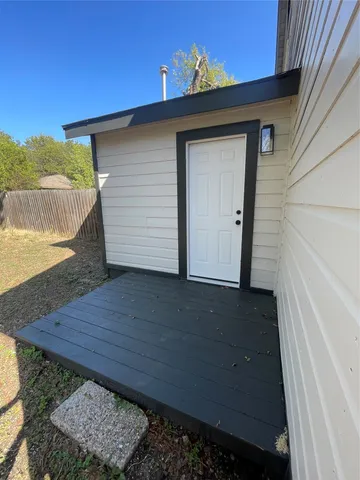 a view of a small space in the backyard of a house