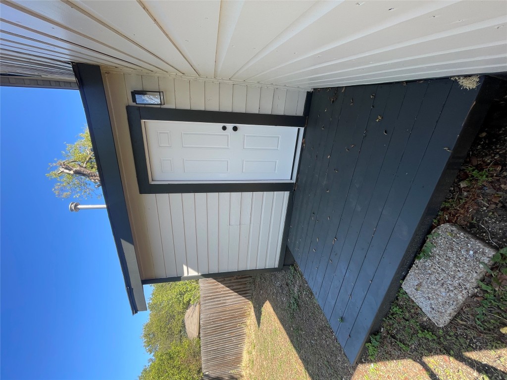 7406 Bethune Avenue Austin, TX 78752 - Photo 34 of 38 a view of a small space in the backyard of a house
