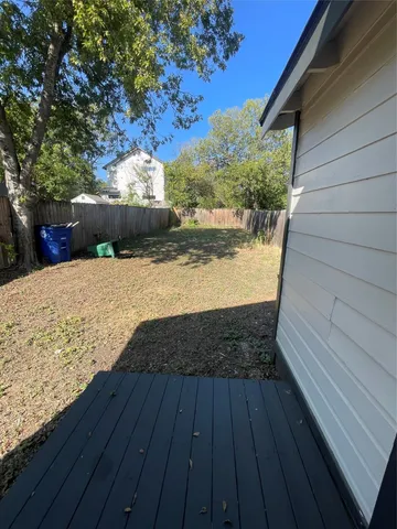 a view of outdoor space with wooden deck