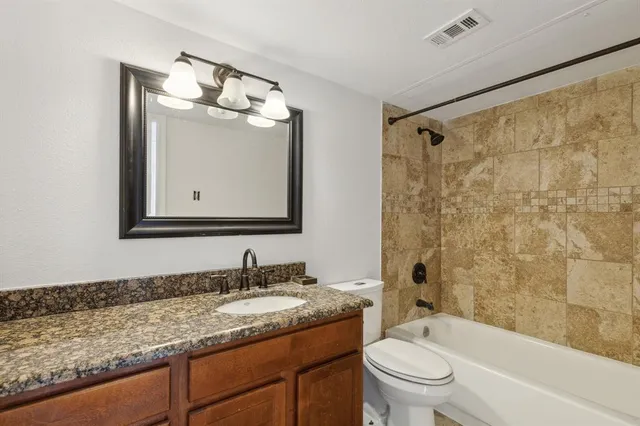 a view of a building from a balcony