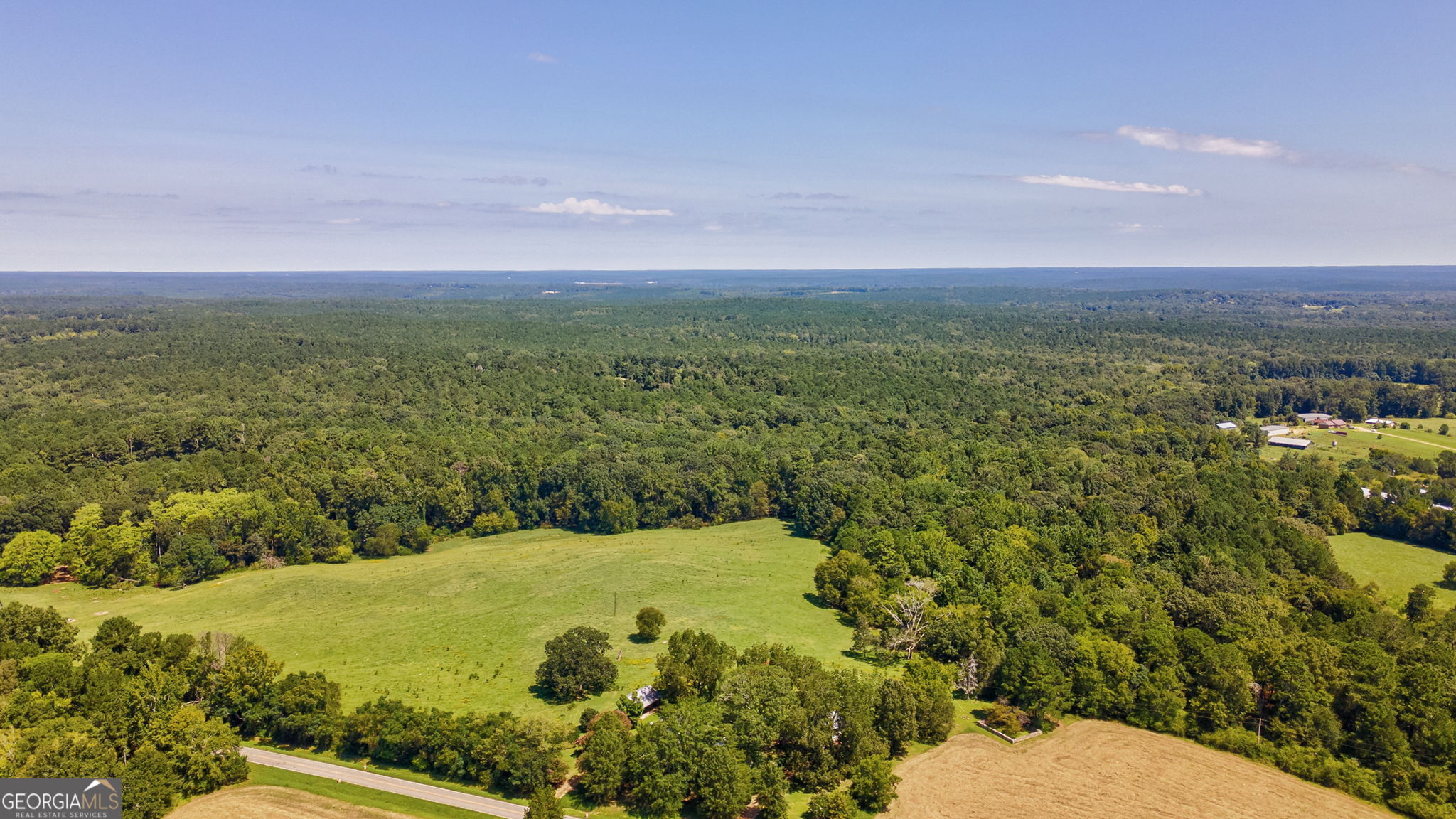 1761 Farmington Road Madison, GA 30650 - Photo 46 of 61 a view of lake with city