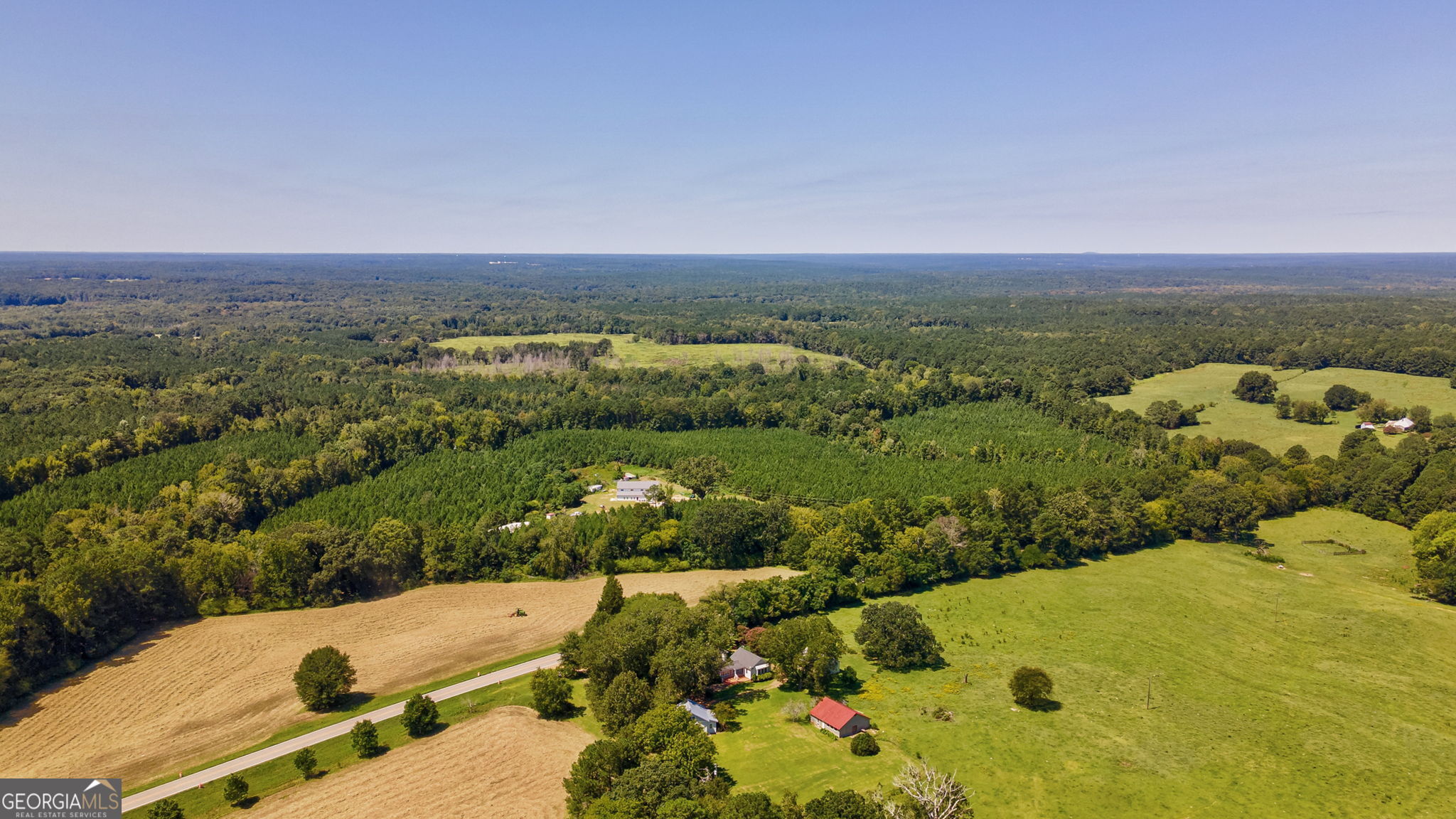 1761 Farmington Road Madison, GA 30650 - Photo 47 of 61 an aerial view of a residential houses with outdoor space
