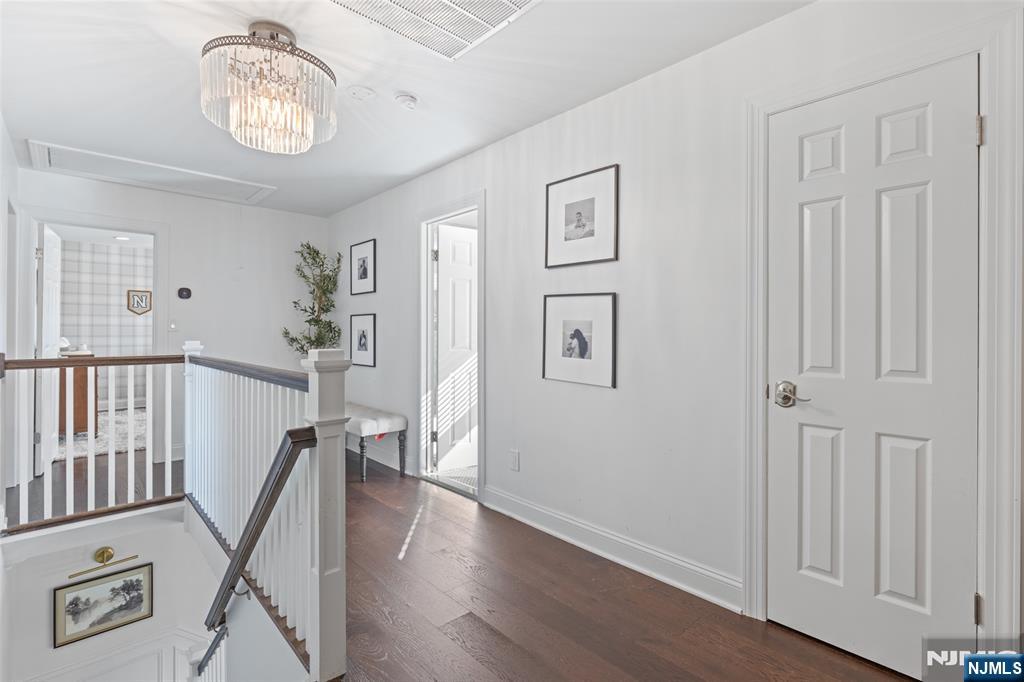 11 Robin Hood Way Wayne, NJ 07470 - Photo 20 of 36 a view of an entryway with wooden floor