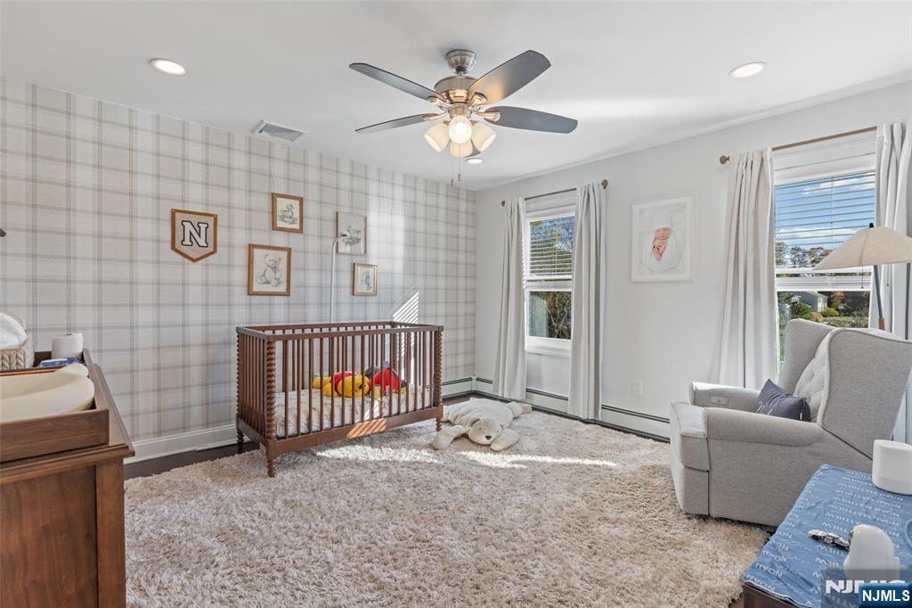 11 Robin Hood Way Wayne, NJ 07470 - Photo 25 of 36 a view of livingroom with furniture and windows