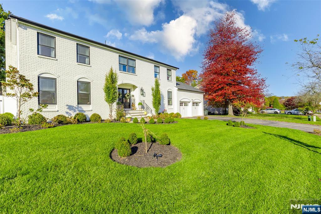 11 Robin Hood Way Wayne, NJ 07470 - Photo 5 of 36 a view of a house with a backyard