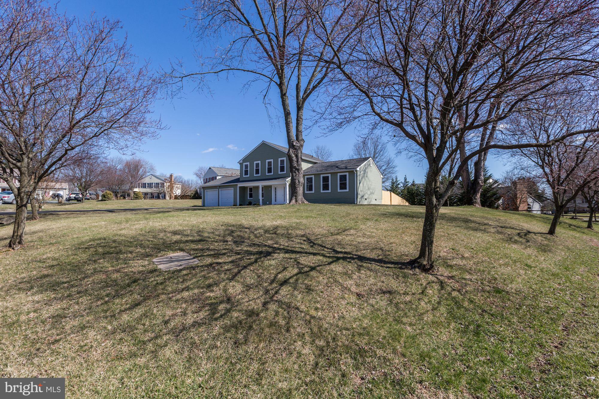 19608 Mosby Way Poolesville, MD 20837 - Photo 8 of 47 a view of a house with a yard