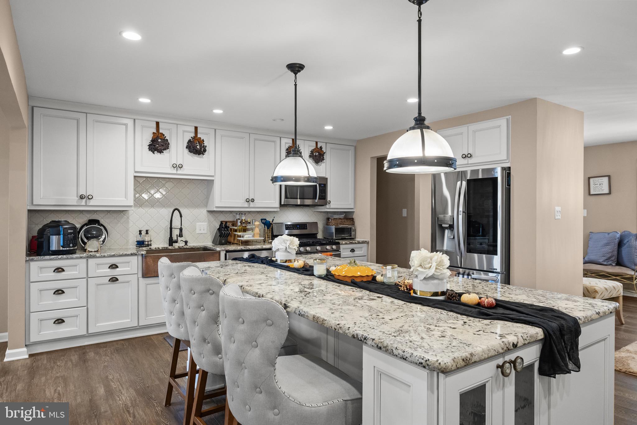 155 Tuckerton Road Medford Lakes, NJ 08055 - Photo 10 of 48 a kitchen with stainless steel appliances granite countertop a stove a sink a kitchen island a stove and a cabinets