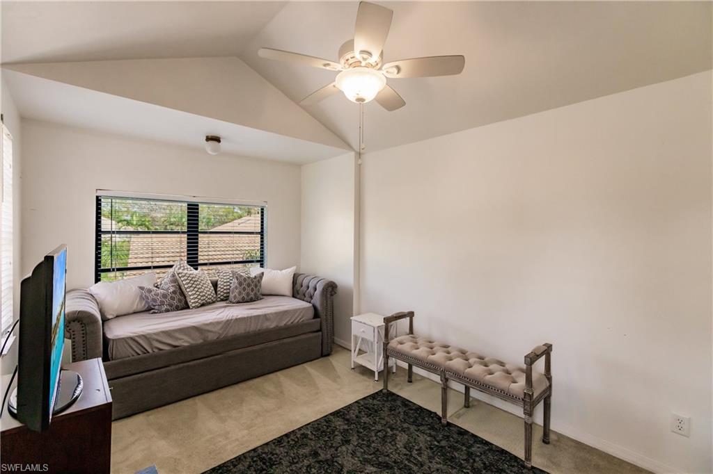 Undisclosed Address Naples, FL 34113 - Photo 14 of 24 a living room with furniture and a window