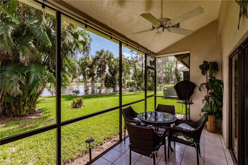 Undisclosed Address Naples, FL 34113 - Photo 20 of 24 a view of a porch with furniture and a backyard