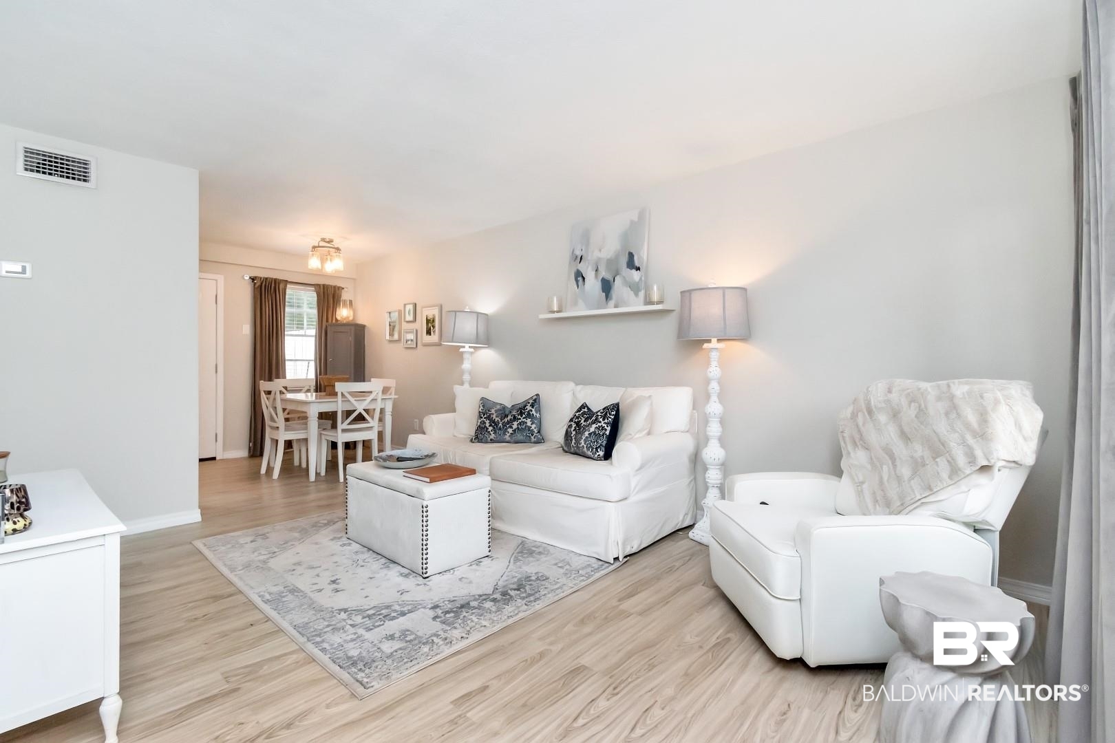 110 Du Rhu Drive, Unit C Mobile, AL 36608 - Photo 2 of 14 Living room with light hardwood / wood-style floors