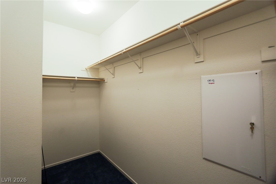6472 Centennial Road Pahrump, NV 89048 - Photo 10 of 29 Ample shelving and hanging space defines this practical closet.