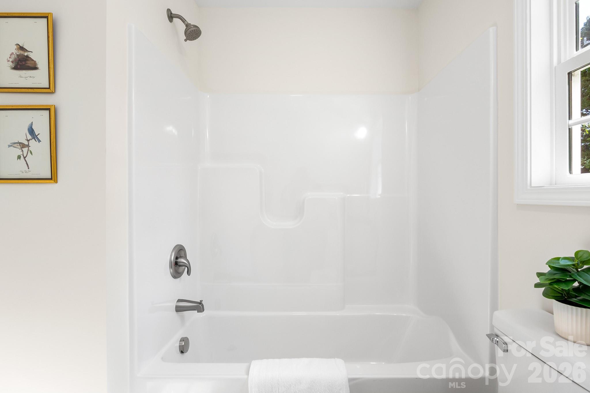 805 Hunter Street York, SC 29745 - Photo 18 of 38 a bathroom with a bathtub
