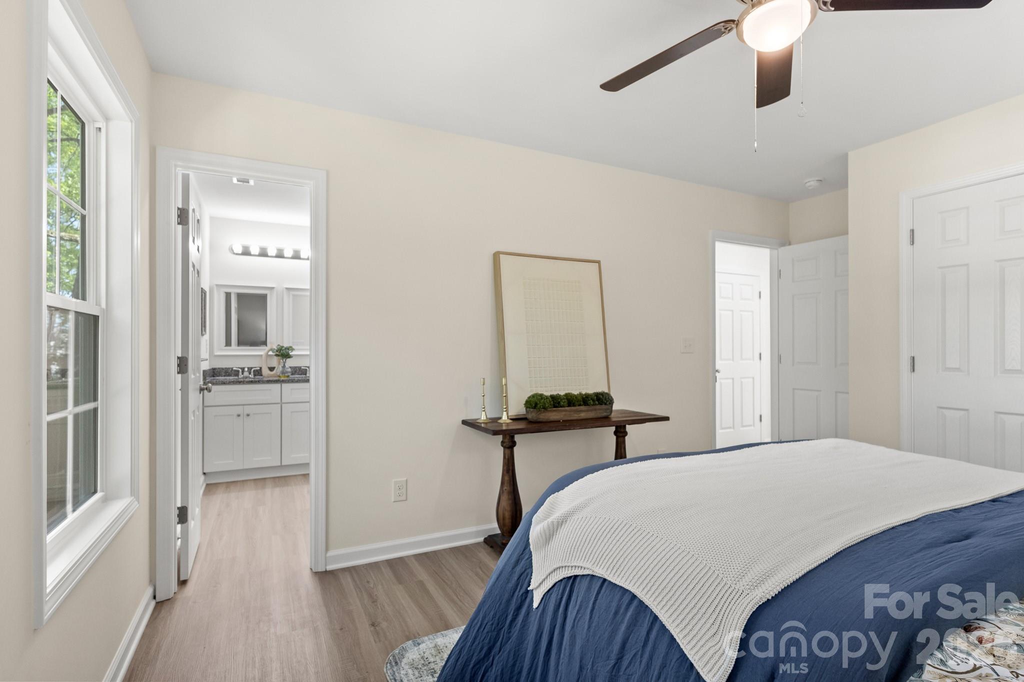 805 Hunter Street York, SC 29745 - Photo 23 of 38 a bedroom with a bed and a view of bathroom