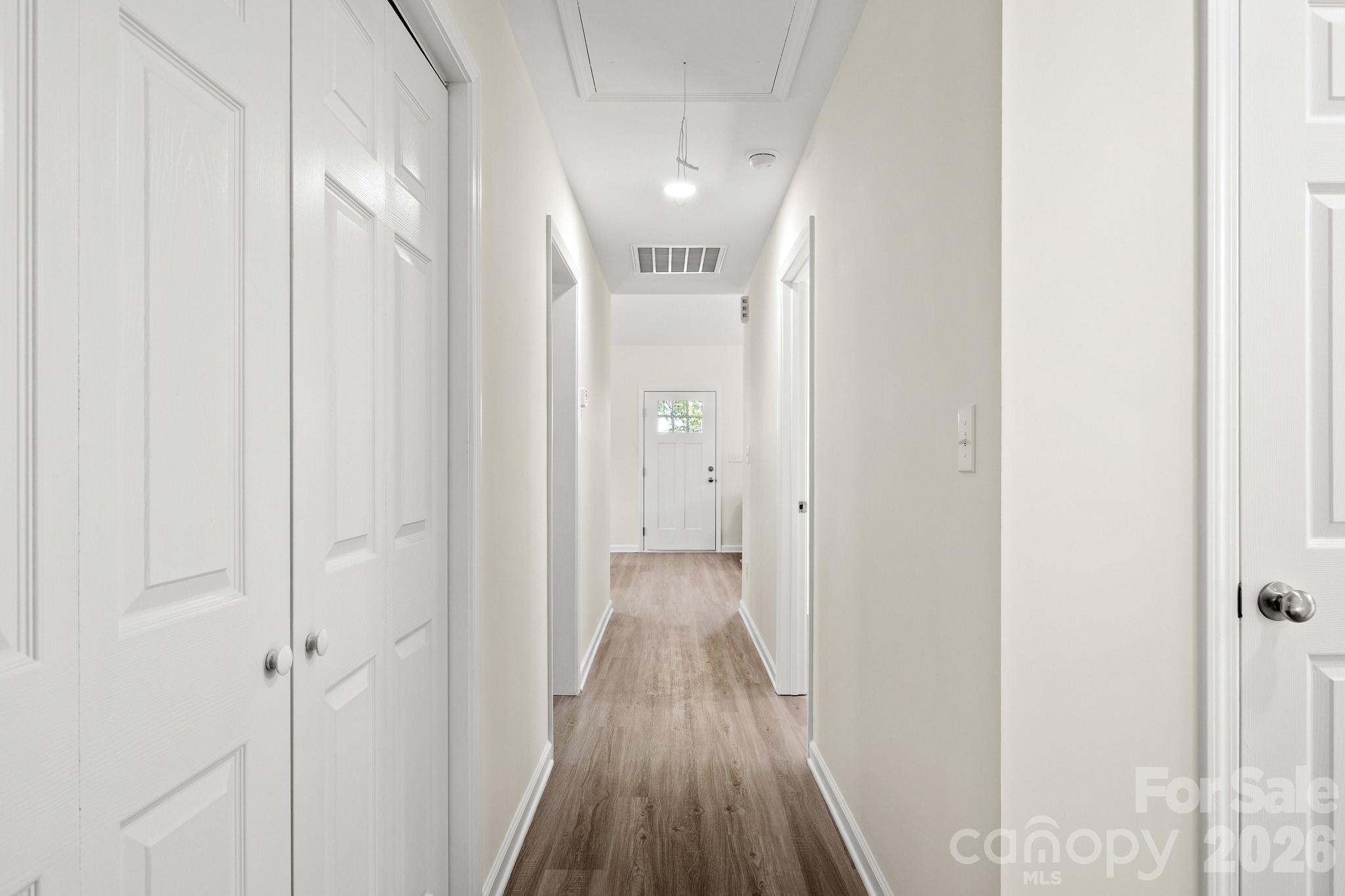 805 Hunter Street York, SC 29745 - Photo 26 of 38 a view of a hallway with wooden floor