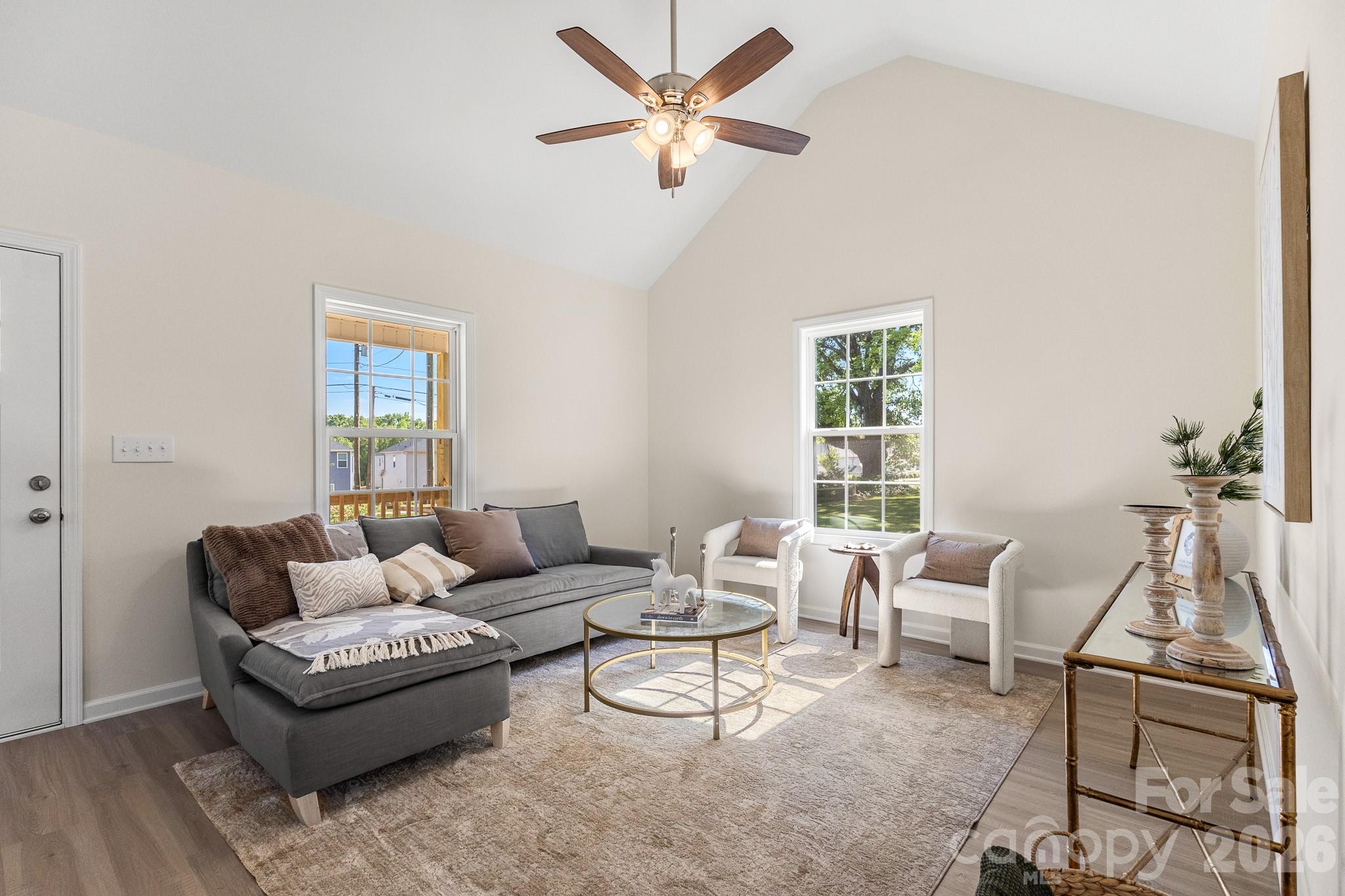 805 Hunter Street York, SC 29745 - Photo 3 of 38 a living room with furniture a ceiling fan and a window