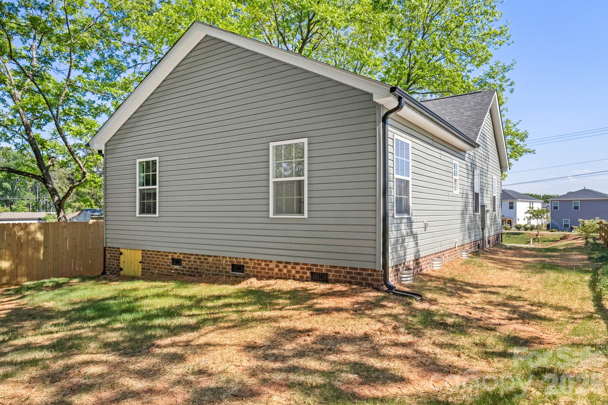 805 Hunter Street York, SC 29745 - Photo 36 of 38 a view of a house with a yard