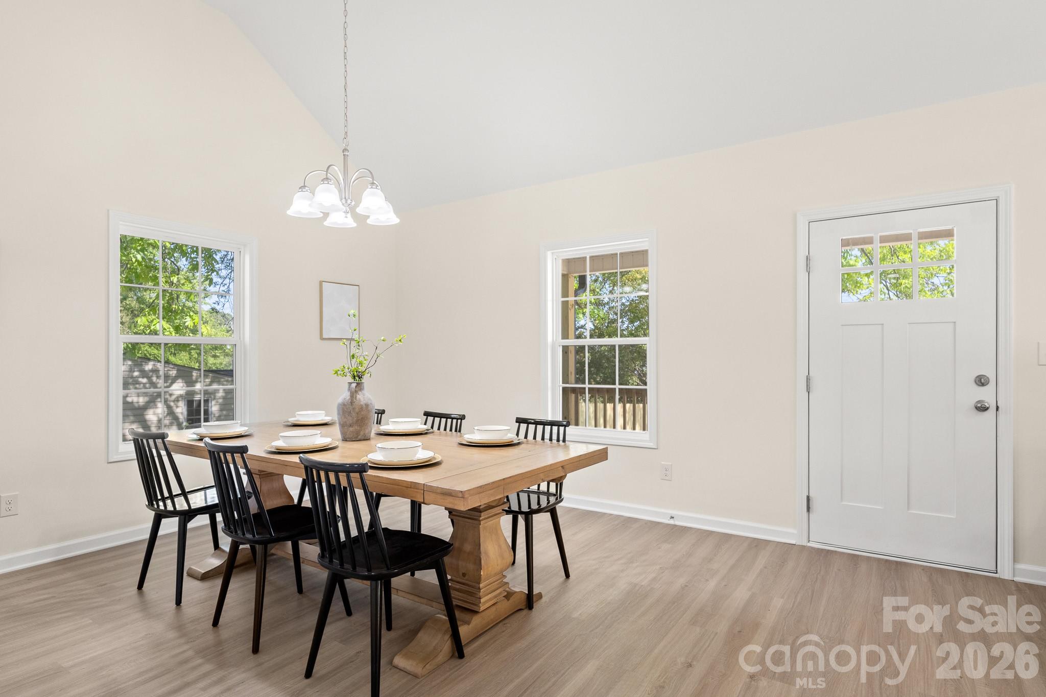 805 Hunter Street York, SC 29745 - Photo 8 of 38 a view of a dining room with furniture window and wooden floor