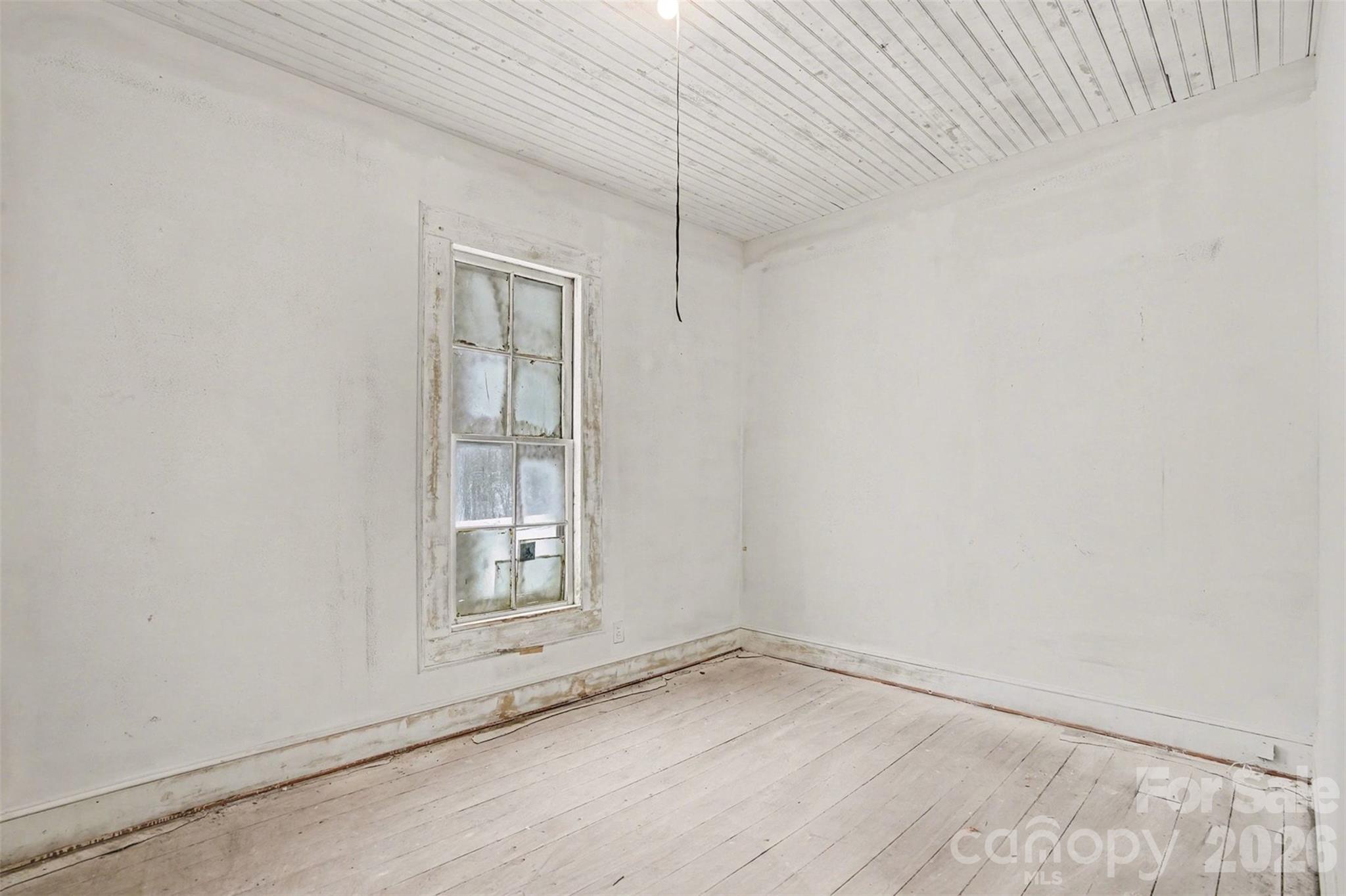 540 South Halifax Street Mount Pleasant, NC 28124 - Photo 16 of 34 a view of empty room with wooden floor and fan