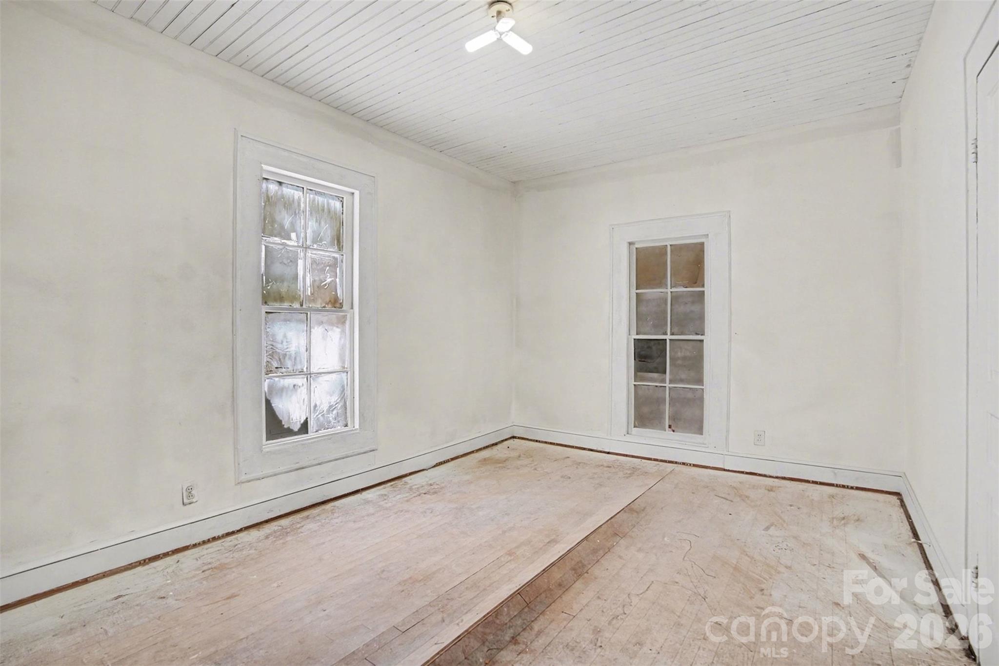 540 South Halifax Street Mount Pleasant, NC 28124 - Photo 7 of 34 an empty room with windows and closet