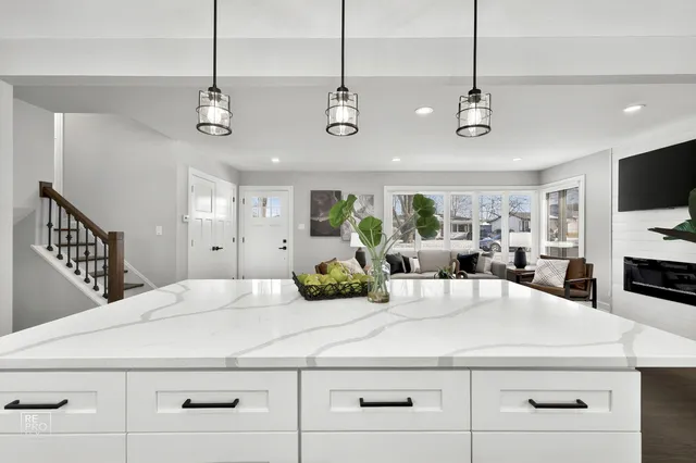 a view of living room with furniture and flat screen
