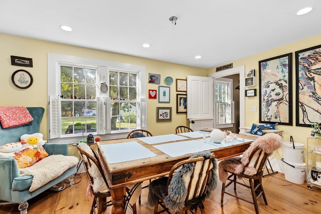 982 Main Street Hingham, MA 02043 - Photo 20 of 41 a living room with furniture and a window