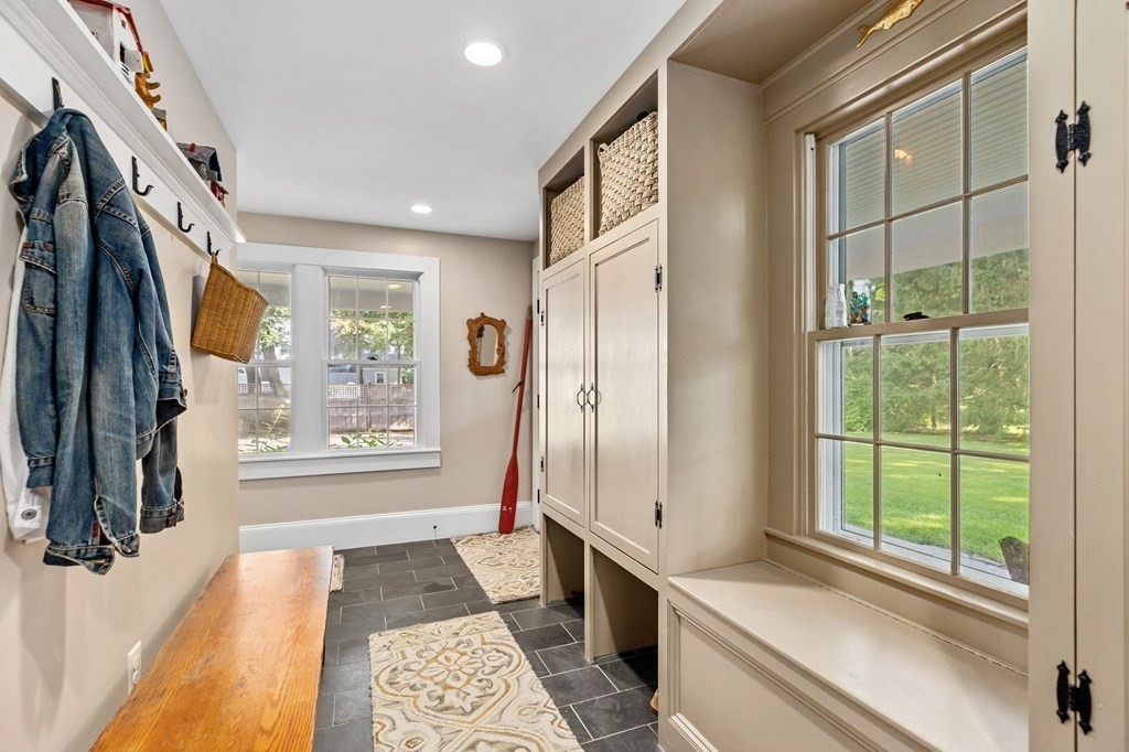 982 Main Street Hingham, MA 02043 - Photo 21 of 41 a bathroom with a bathtub and a shower