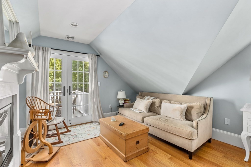 982 Main Street Hingham, MA 02043 - Photo 26 of 41 a living room with furniture and a flat screen tv