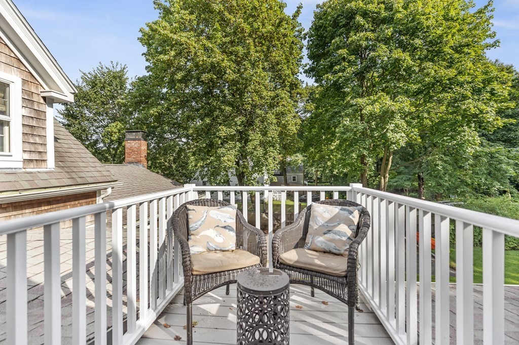 982 Main Street Hingham, MA 02043 - Photo 28 of 41 a view of balcony with wooden floor and outdoor seating