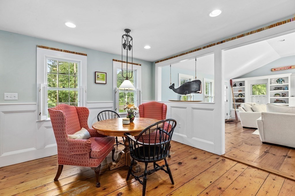 982 Main Street Hingham, MA 02043 - Photo 9 of 41 a dining room with furniture a window and wooden floor
