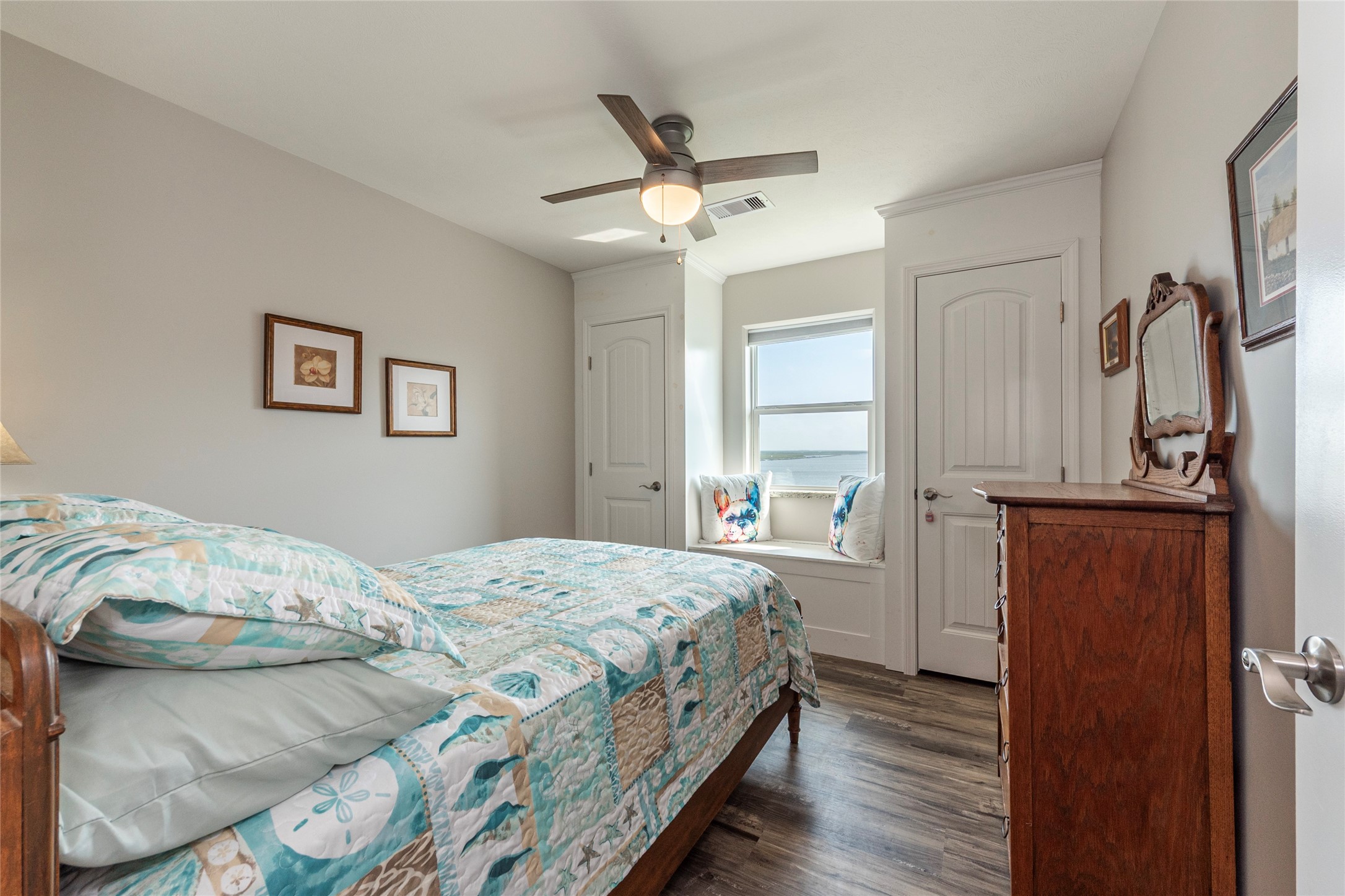 1453 County Road 230 Sargent, TX 77414 - Photo 11 of 30 a bedroom with a bed and a window