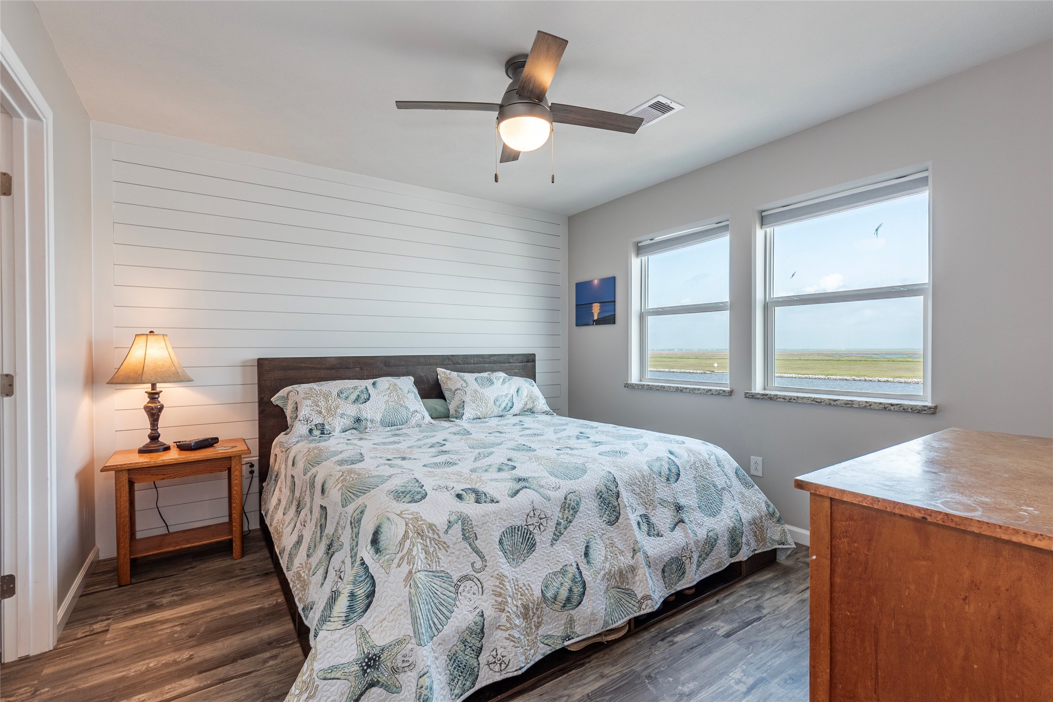 1453 County Road 230 Sargent, TX 77414 - Photo 12 of 30 a bedroom with a bed and a window